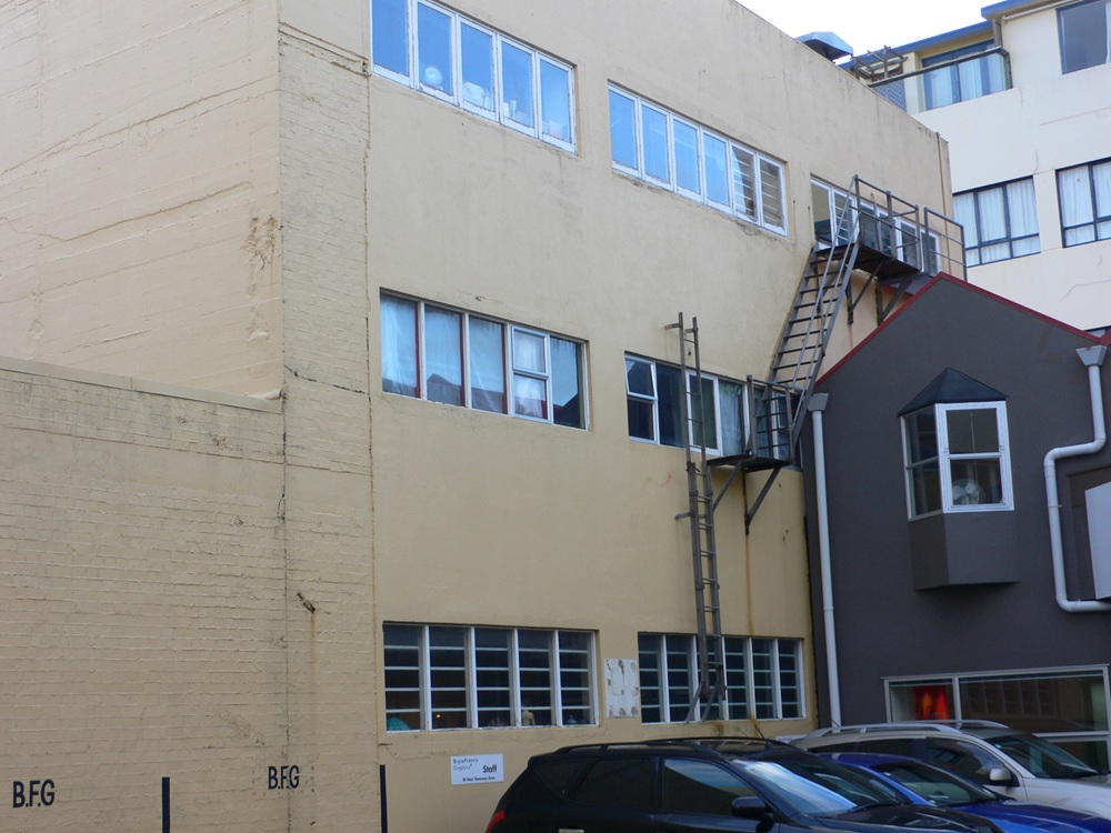 A picture containing building, apartment buildingDescription automatically generated